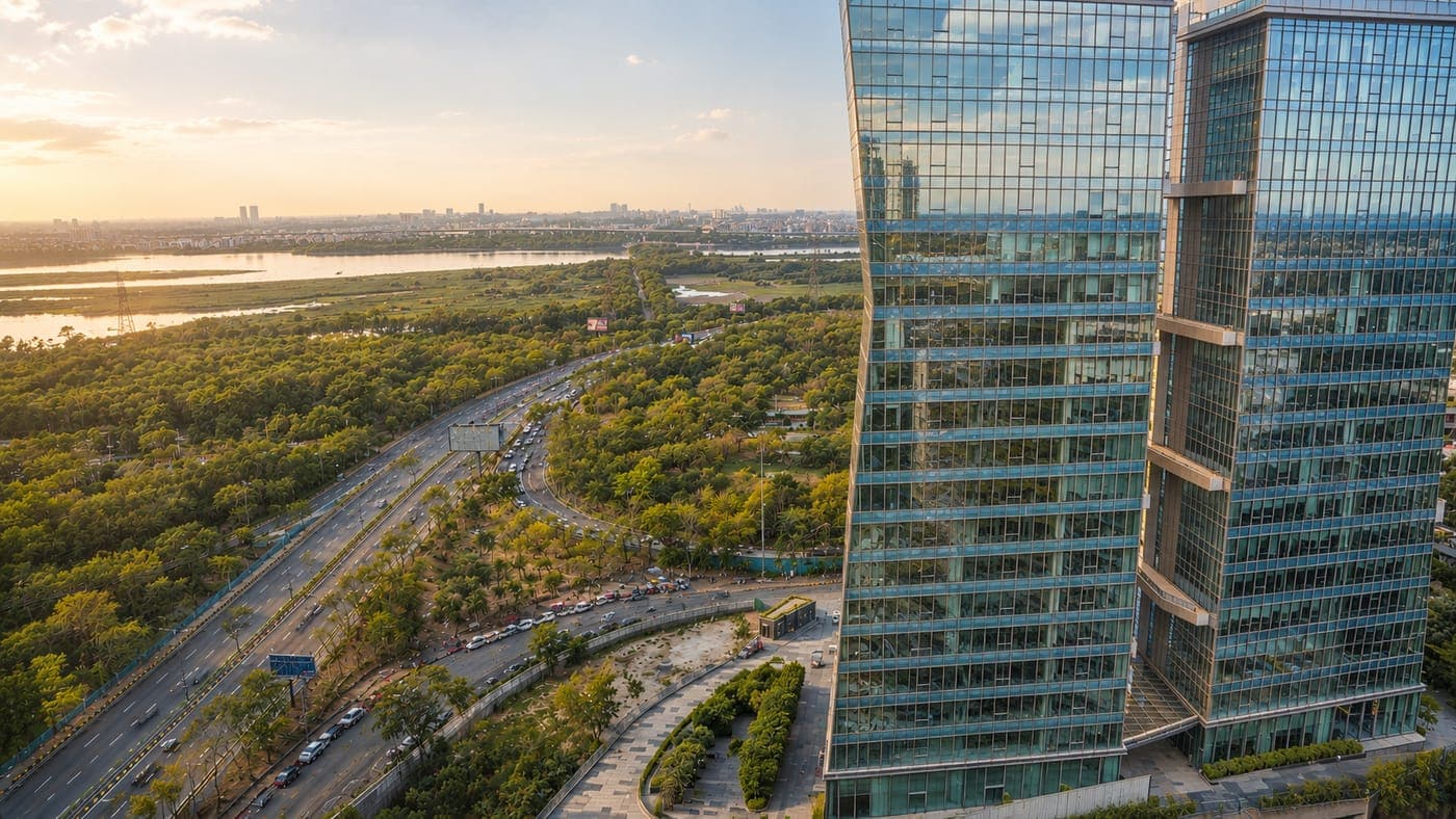 Max Towers glass facade overlooking the river